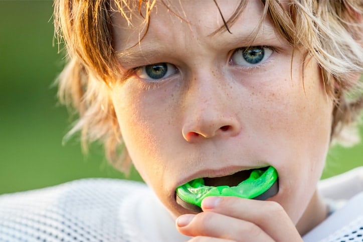 boy with sports mouthguard