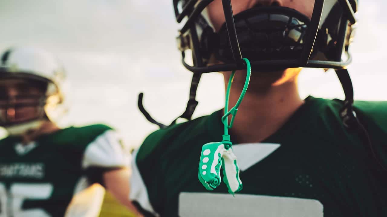 Why Do Football Players Wear Mouthpieces